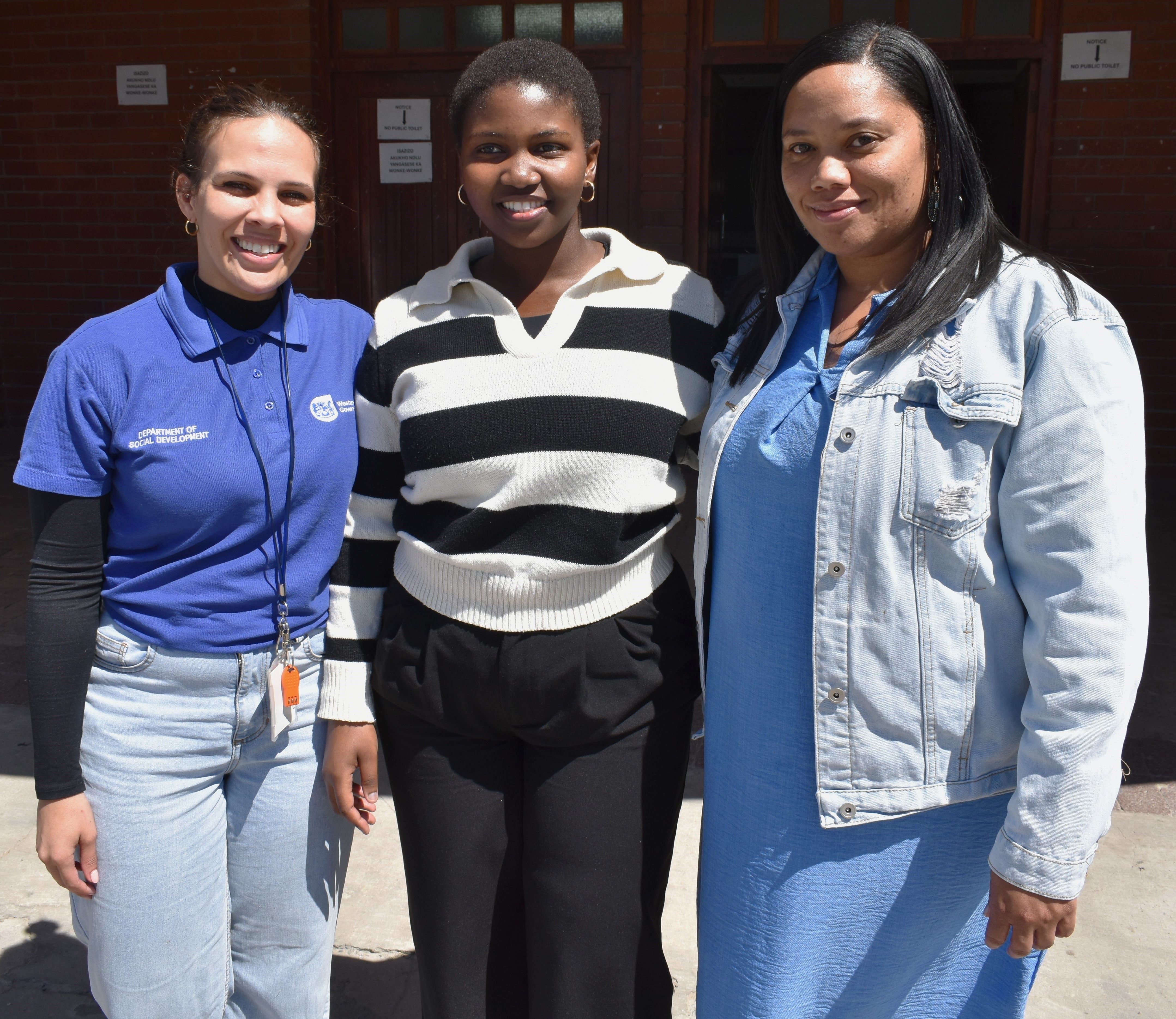 DSD Social worker Liesl Siljeur, Nomfihlakalo Twala, and DSD Social worker Chandre Pienaar