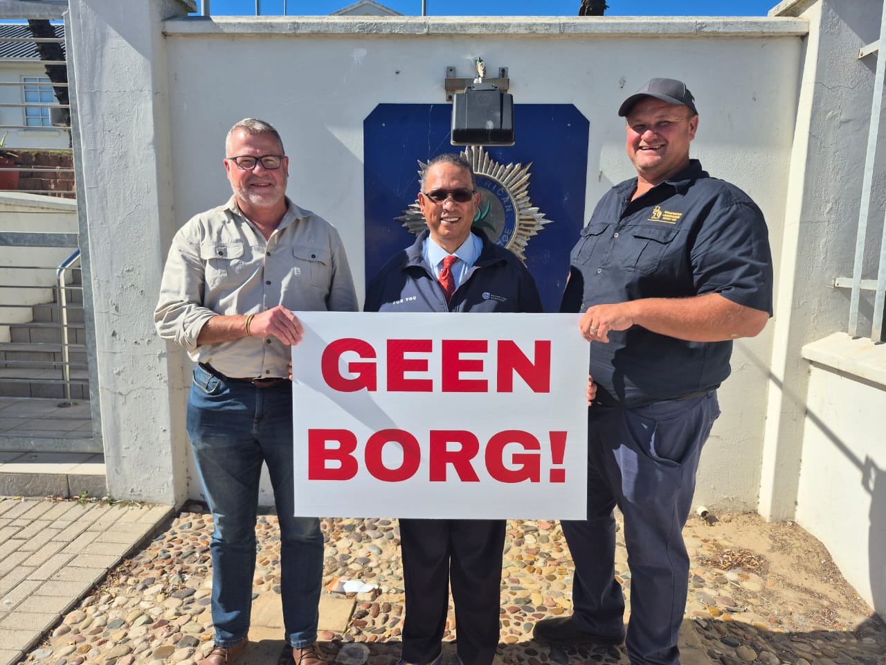 Minister Meyer and Jannie Strydom CEO of Agri WC outside the court in Lamberts Bay