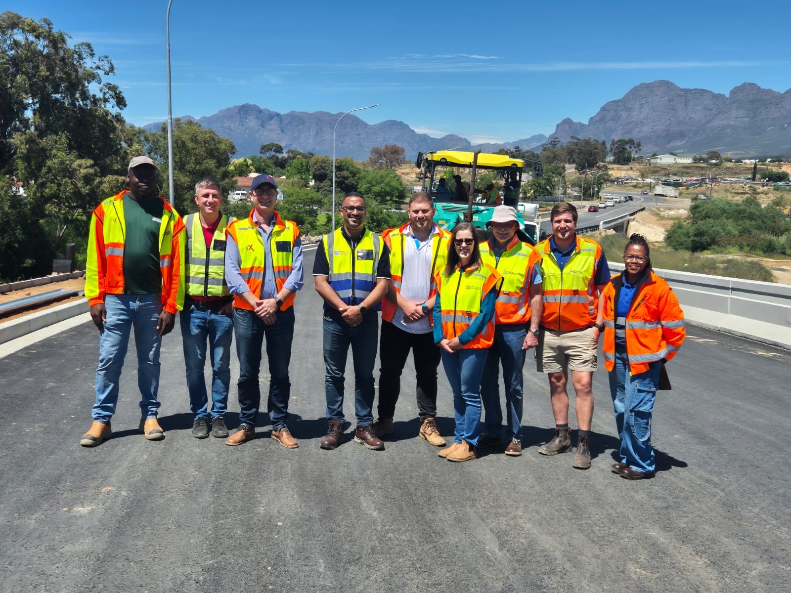 Min Simmers with the project team on the MR191 road-over rail bridge