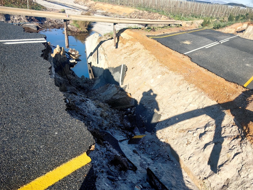 Place where culvert was compromised and road washed away