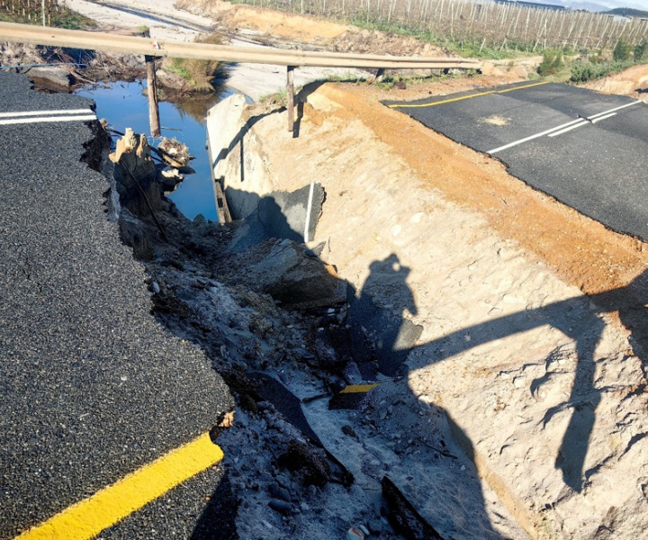 Place where culvert was compromised and road washed away