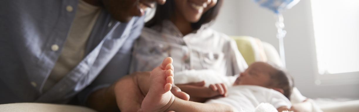 New-born baby with parents_birth certificate