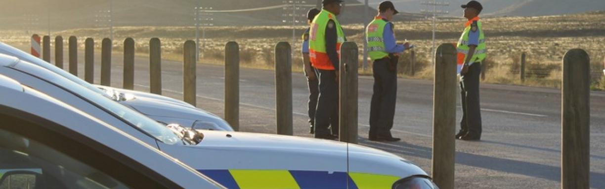 Traffic officers standing on the road