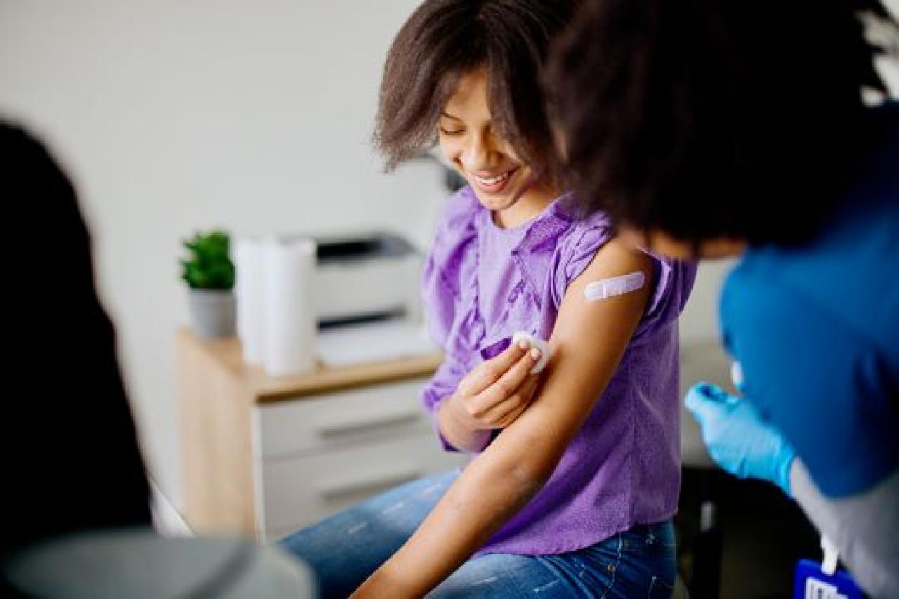 Young girl getting a vaccine