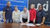 Signing of agreement: Bronwynn Weilbach (Occupational therapist at Outeniekwa CYCC), Chief Director Leana Goosen, Minister Jaco Londt, Elsie Harmse (Africa Skills CEO), and Barbara Nicholas (Outeniekwa CYCC Manager)