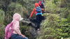 Three young children enjoying the steep hike up Devil’s Peak. 