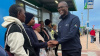 Minister Sileku at Go George bus stop