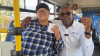 minister-sileku-with-a-resident-aboard-a-go-george-bus