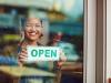 Young woman opening a business