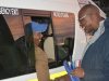Minister Sileku engages with commuter 