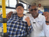 minister-sileku-with-a-resident-aboard-a-go-george-bus