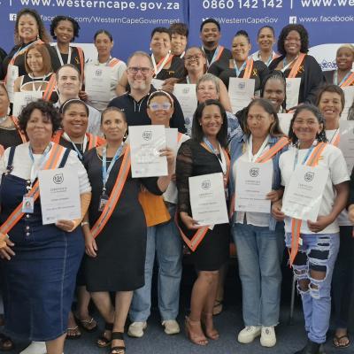 Minister Jaco Londt, DSD HOD Dr Robert Macdonald, and Chief Director Annemie van Reenen with the Metro North GBV Ambassadors.