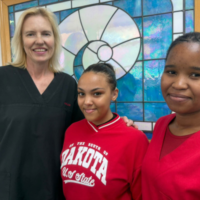 From left to right – Jeannette Birkenstock, Assistant Director, Department of Speech Therapy and Audiology at Tygerberg Hospital; Micah Classen; Nokwanda Ndlovu, Audiologist at Tygerberg Hospital