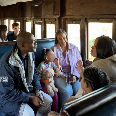 Minister Sileku aboard a train