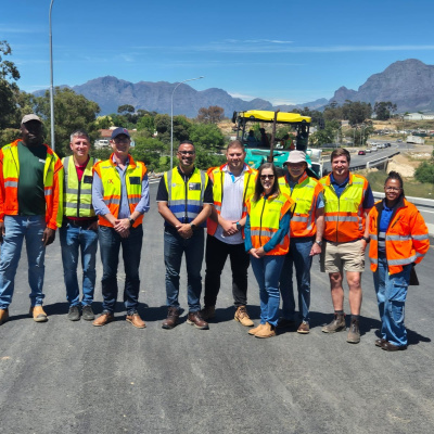 Min Simmers with the project team on the MR191 road-over rail bridge